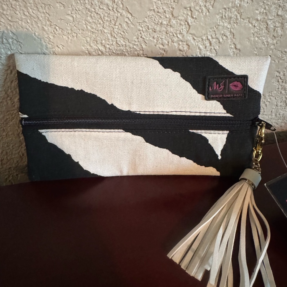 NWT Mini Makeup Junkie bag Black and White with Tassel
